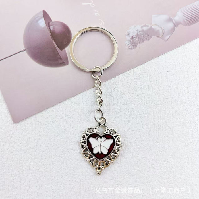 Wholesale Gothic style dark keychain pendant metal heart hot girl style palm bag cross pendant