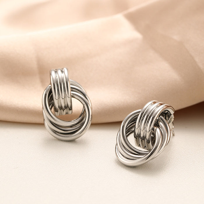 Wholesale Exaggerated double knot earrings, personalized copper plated earrings, niche high-end, light luxury temperament earrings