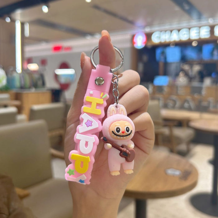 Wholesale Cute cartoon silicone keychain with cute little monster keychain for sweatshirt