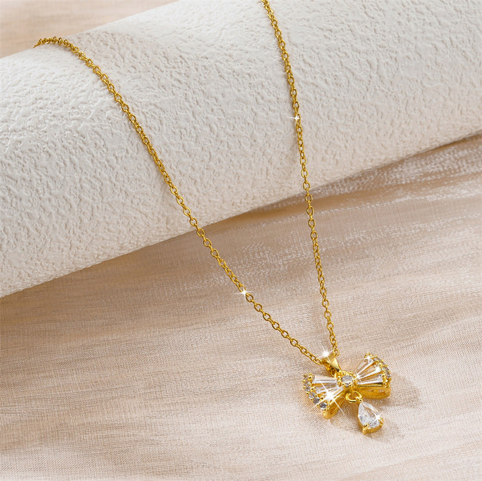 Wholesale Zirconia inlaid bow pendant accessory, titanium steel necklace, niche design, versatile collarbone chain accessory