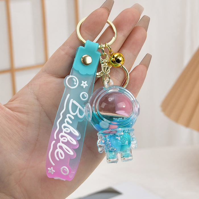 Wholesale Acrylic oil bottle candy Bean astronaut keychain