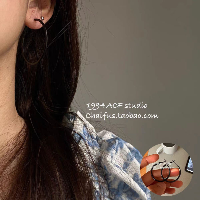 Wholesale Pure silver earrings with large circles, plain circles, and high-end feel. Round circle earrings