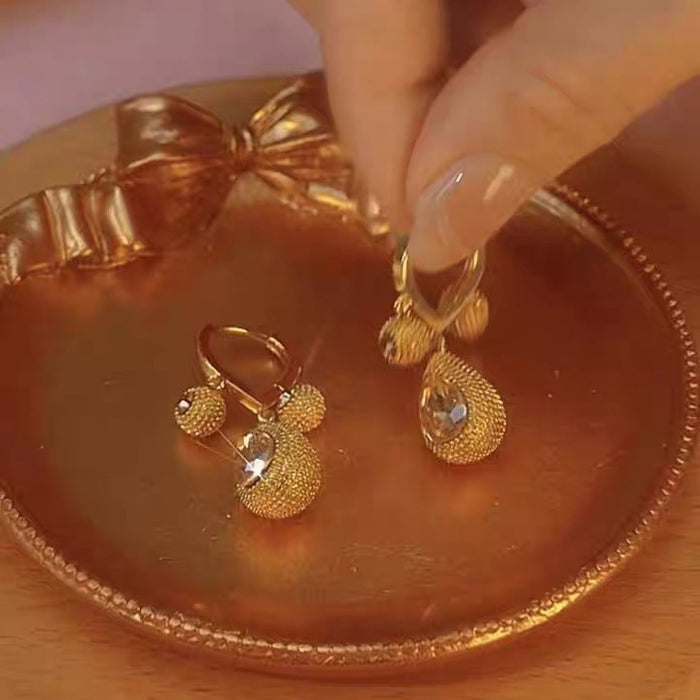 Wholesale Light luxury high-end coffee colored zircon earrings for women, with a niche design and versatile temperament. Earrings with fashionable water droplet earrings and buckles