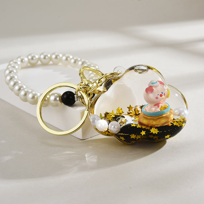 Wholesale Oil-Filled Black Gold Quicksand Piggy Liquid Keychain