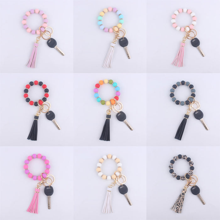 Wholesale Silicone bracelet wrist keychain tassel pendant