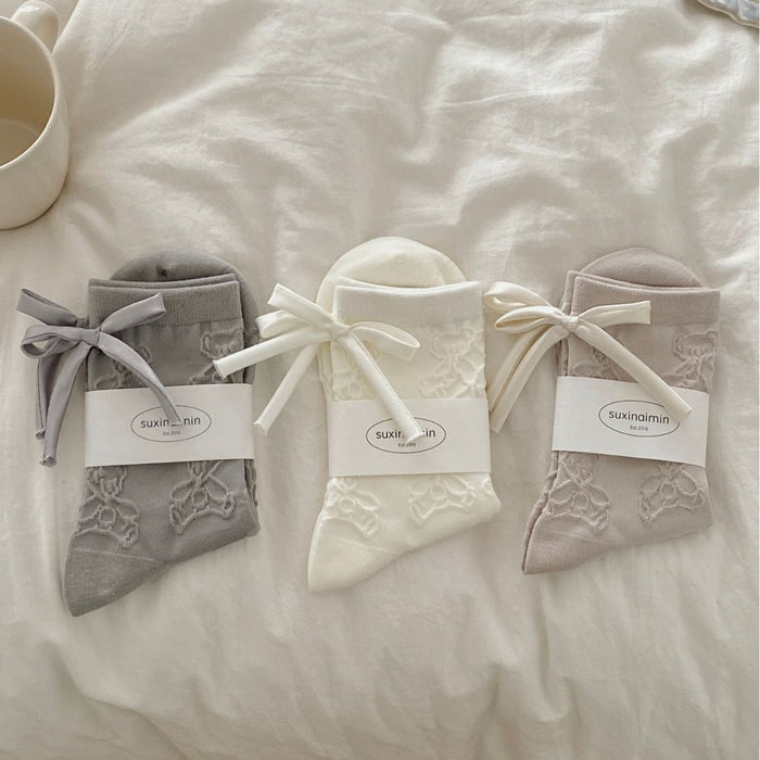 Wholesale Bow shaped mid tube socks with boneless pile socks