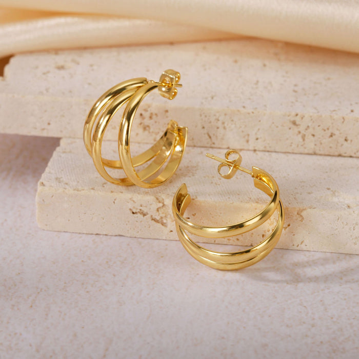 Wholesale Geometric Titanium Steel Three-Line Dense Earrings