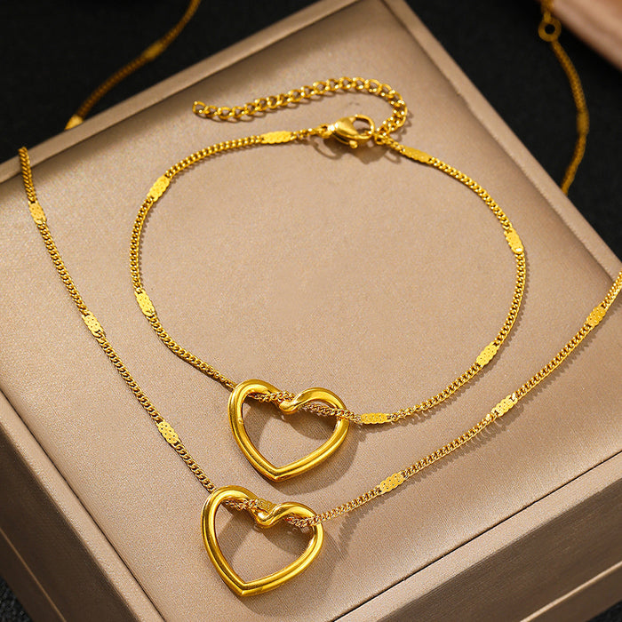 Wholesale Stainless steel niche hollow heart necklace bracelet with simple design pendant collarbone chain set