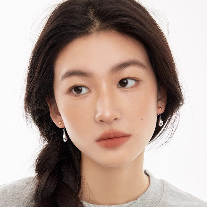 Wholesale Retro contrasting water droplet earrings with niche design, high-end sense, simple personality, fashionable temperament, silver plated earrings