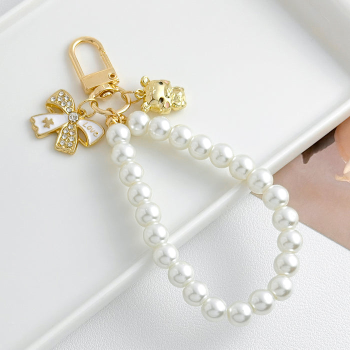 Wholesale Pearl chain beaded mobile phone lanyard bow pendant keychain
