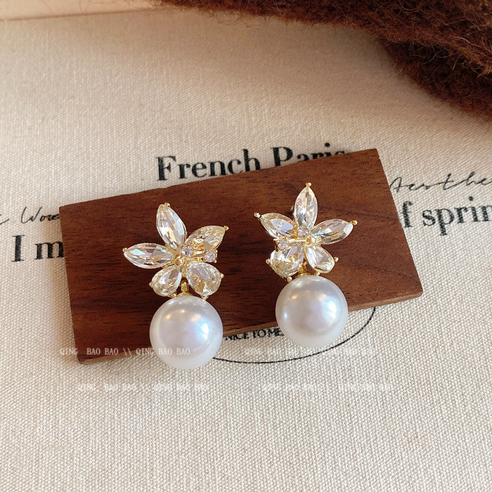 Wholesale Flower zircon imitation pearl earrings, niche design, fashionable earrings, high-end sense, simple and versatile earrings