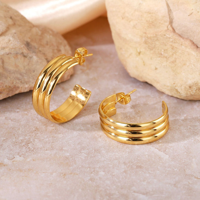 Wholesale Geometric Titanium Steel Three-Line Dense Earrings