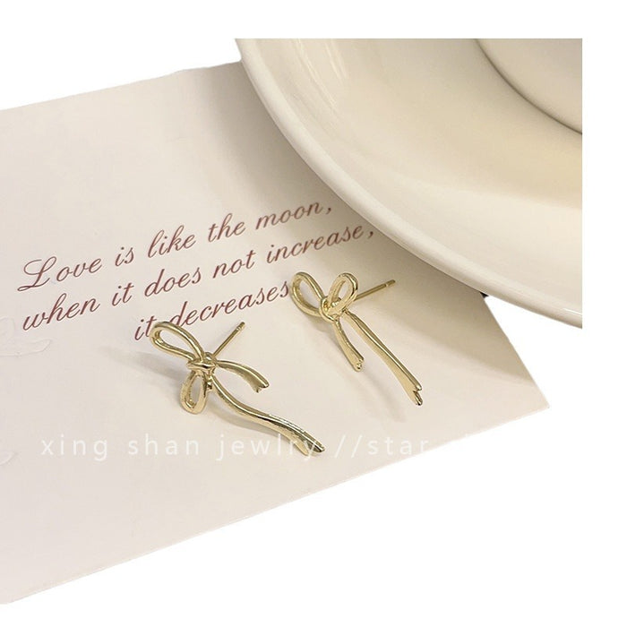 Wholesale Simple bow earrings girl fashion Joker cold wind earrings