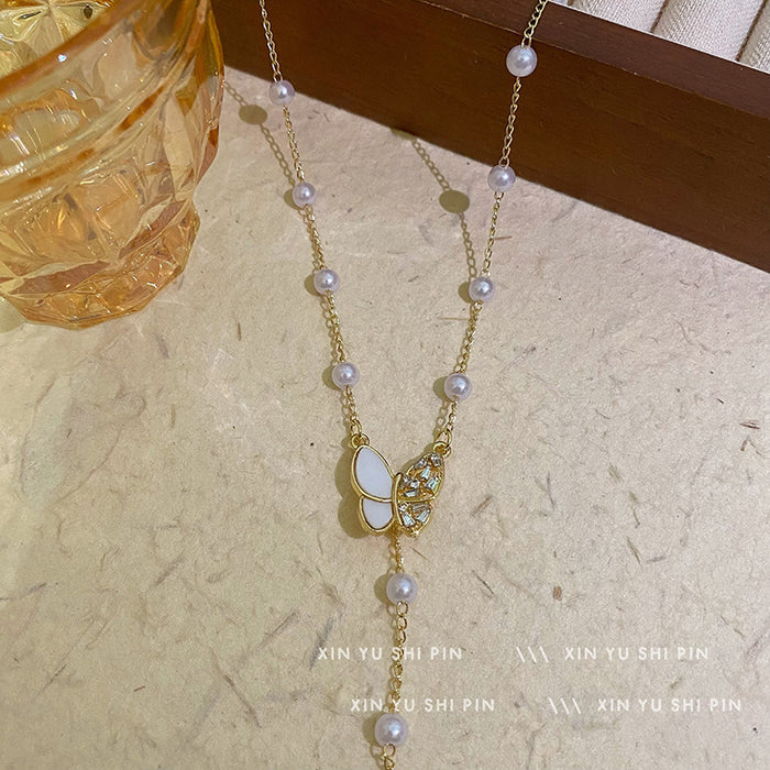 Wholesale Butterfly tassel pearl necklace, light luxury, high-end feeling, collarbone chain, new necklace