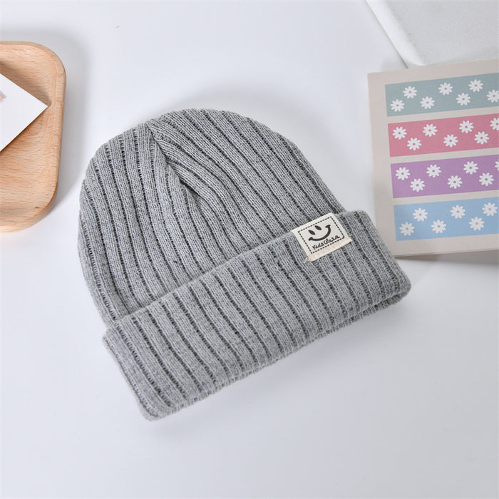 Wholesale Casual, fashionable, warm knit hat, cute smiling face pullover hat