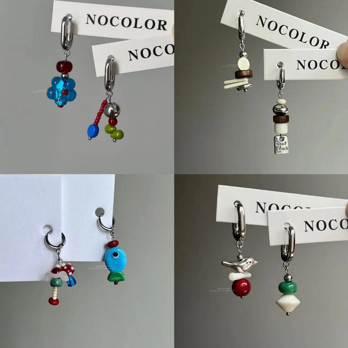 Wholesale Retro bead asymmetrical flower ear buckle design with a sense of niche temperament, simple and unique ear buckle