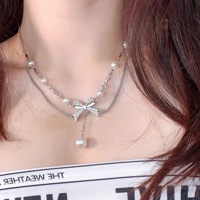 Wholesale Bow Pearl Tassel Alloy Necklace JDC-NE-TongS003