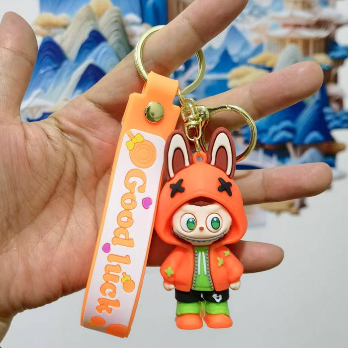 Wholesale Cute cartoon trendy schoolbag pendant keychain furry cute little monster