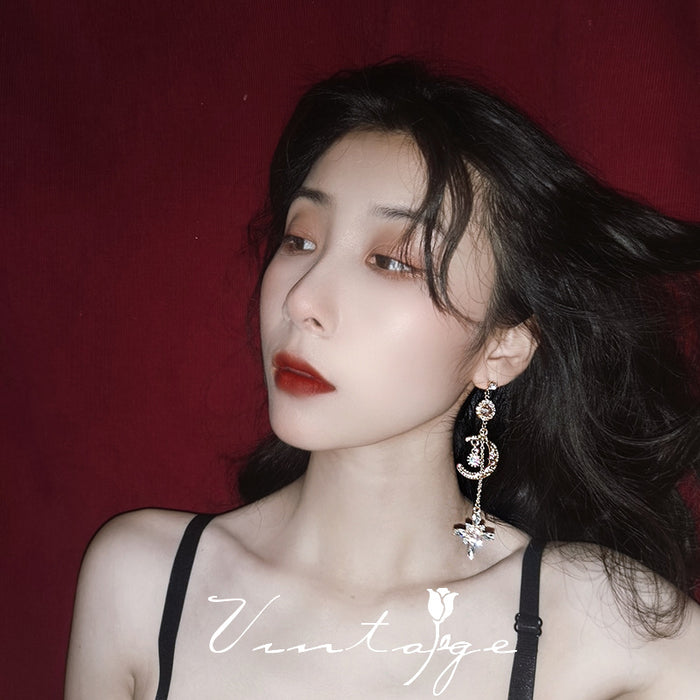 Wholesale Asymmetric rhinestone droplet earrings ear clip