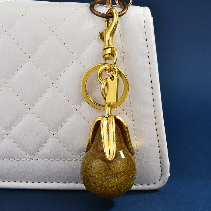 Wholesale Gilded pear-shaped couple keychains symbolizing eternal love