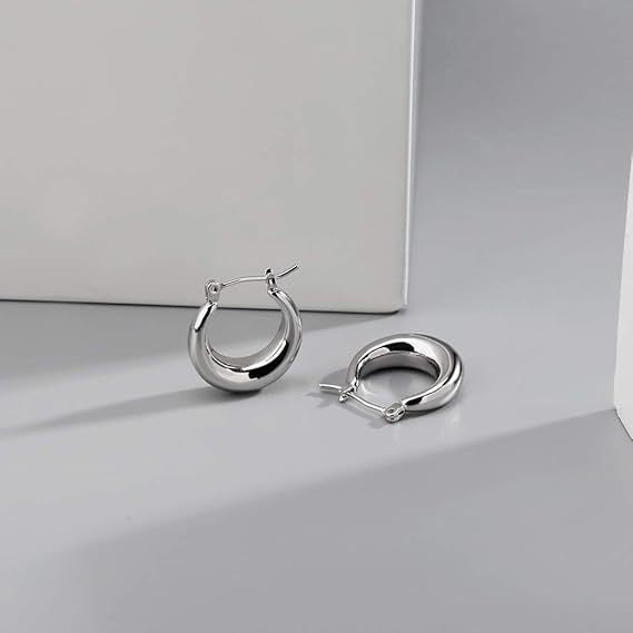 Wholesale Copper plated genuine gold earrings with fashionable and high-end photosensitive surface