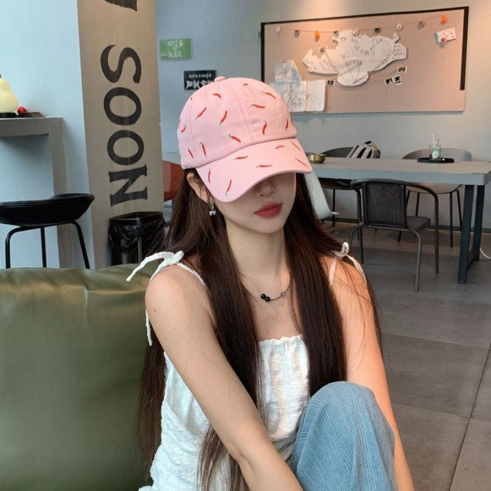 Wholesale Sweet girl style pink baseball cap with playful pepper pattern on the cap, fashionable and eye-catching, versatile style