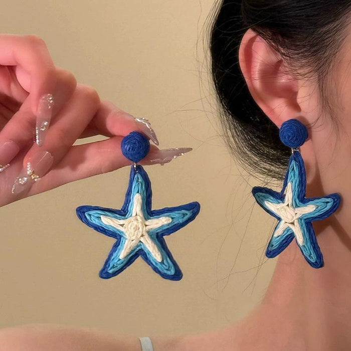 Wholesale Spring and summer new holiday style hand woven starfish earrings Bohemian  earrings