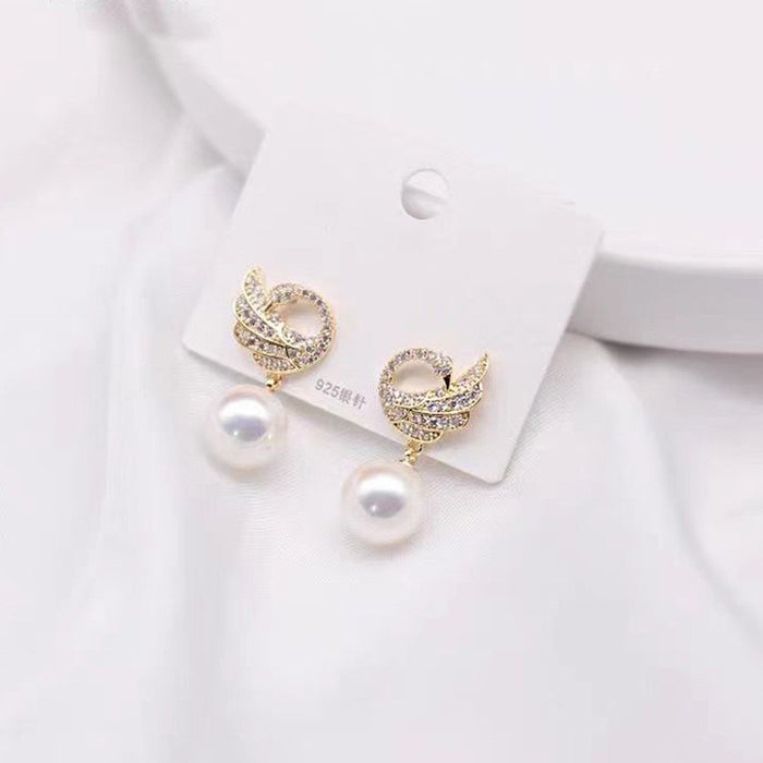 Wholesale Exquisite and elegant diamond studded pearl earrings, high-end and luxurious commuting versatile earrings, stylish and elegant style