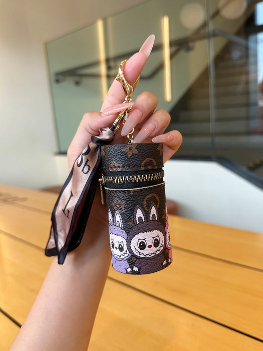 Wholesale Lipstick storage coin purse portable mini small cylinder cosmetic bag with pendant key