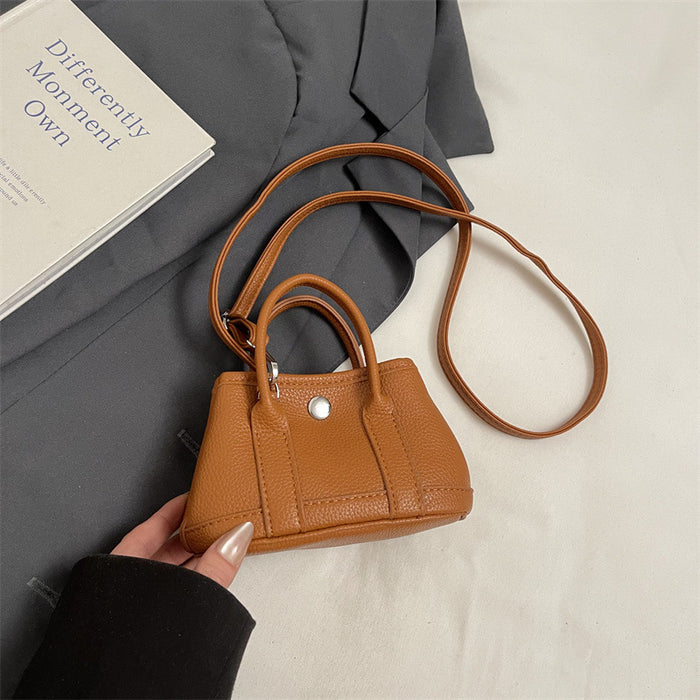 Wholesale Children's bag with high-end lychee pattern mini garden bag, girls' parent-child fashion show crossbody bag