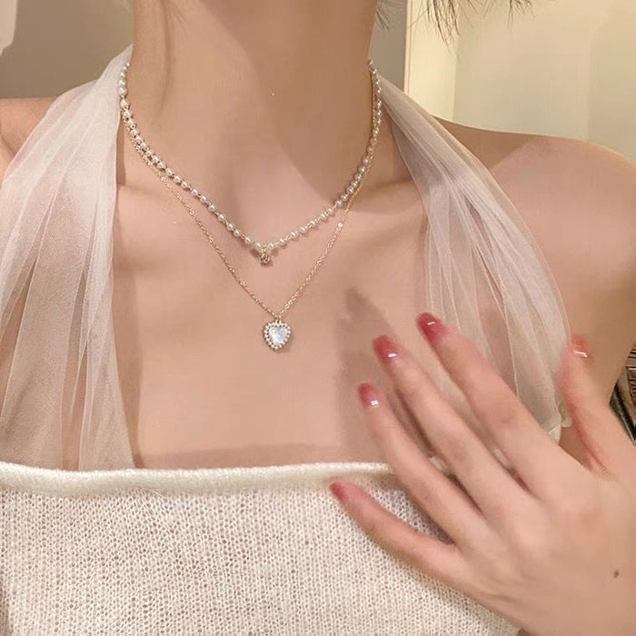 Wholesale A niche high-end pearl double-layer layered necklace with personalized heart pendant and collarbone chain