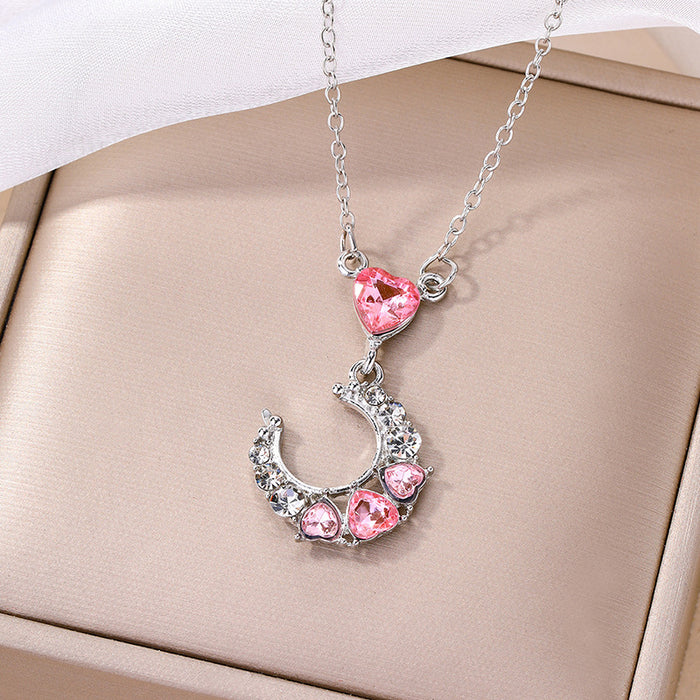 Wholesale Fashion and versatile jewelry with diamond studded heart pendant, personalized and niche alloy moon necklace