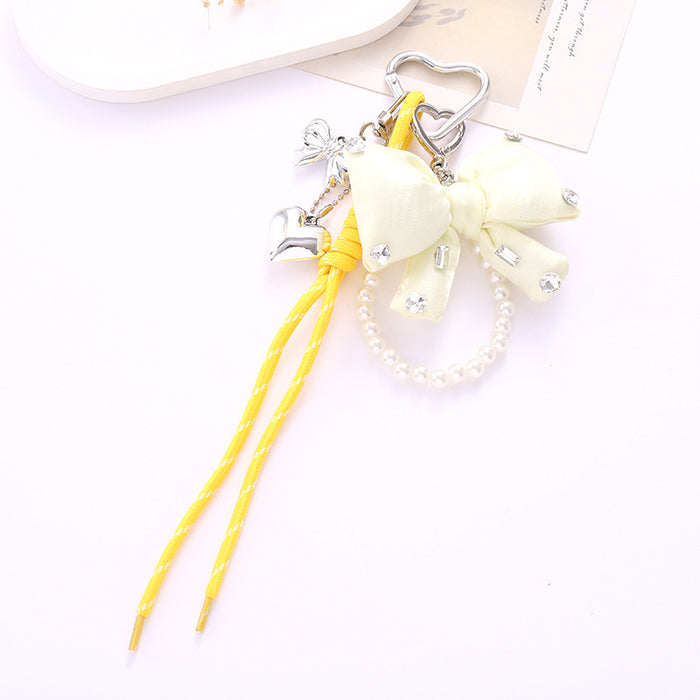 Wholesale Leather bow heart pendant luggage keychain lanyard accessories single buckle tassel pendant accessories