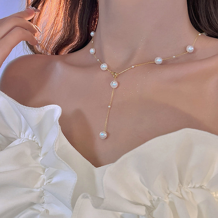 Wholesale Sweater chain pearl long versatile collarbone chain light luxury niche tassel necklace