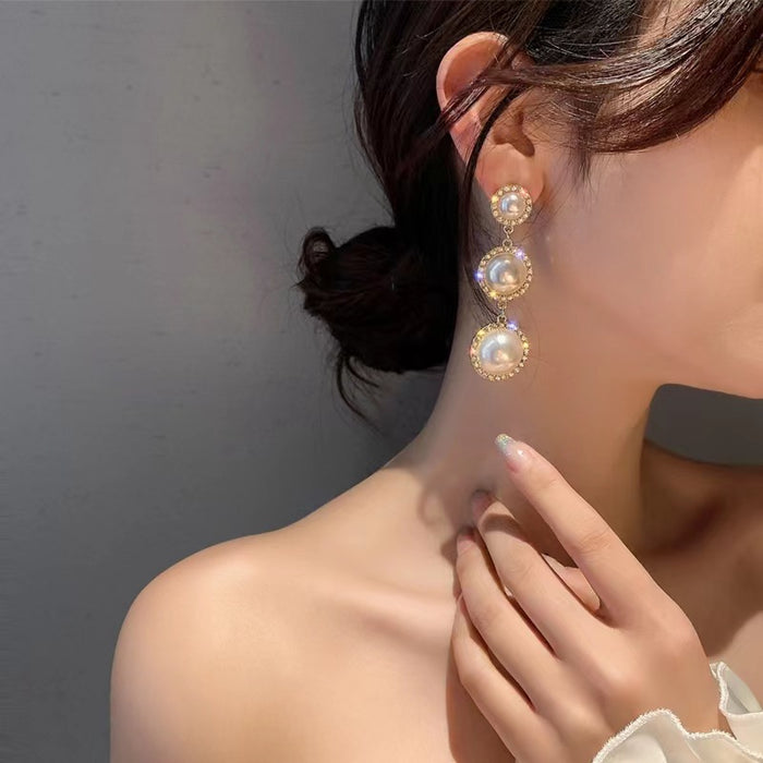 Wholesale Simple temperament pearl tassel earrings silver fashionable design earrings