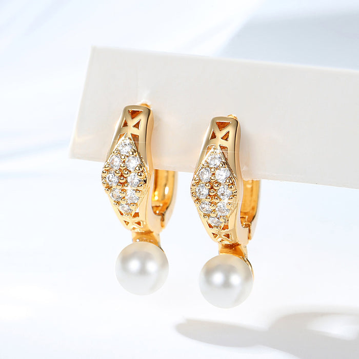 Wholesale Copper gold-plated retro light luxury simple pearl earrings, small and fashionable design, inlaid with zircon ear buckles, wholesale of ear accessories