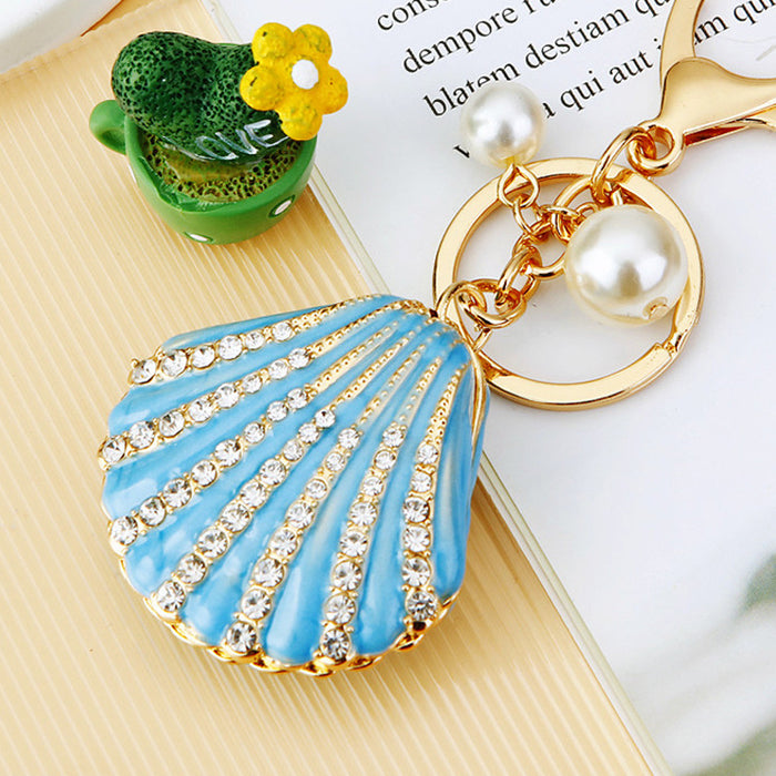 Wholesale Diamond studded pearl shell car keychain pendant, metal keychain ring, alloy accessory