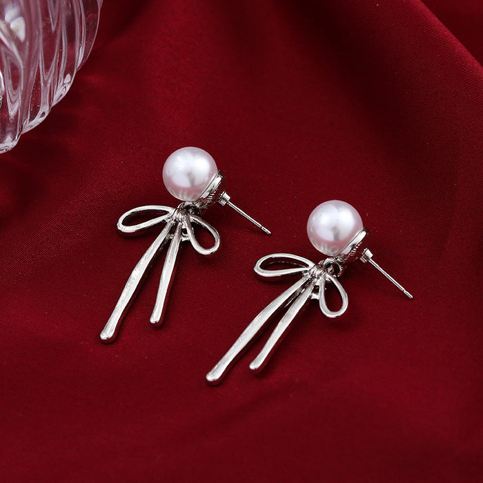 Wholesale Pearl earrings, light luxury, simple bow design, niche design, high-end accessories wholesale