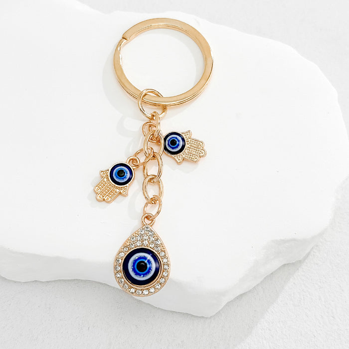 Wholesale Heart-Shaped Palm Water Drop Devil's Eye Pendant Keychain