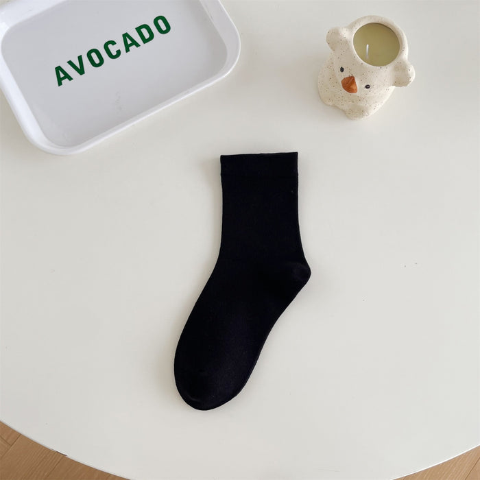 Wholesale Middle school women's solid color simple pile socks made of pure cotton