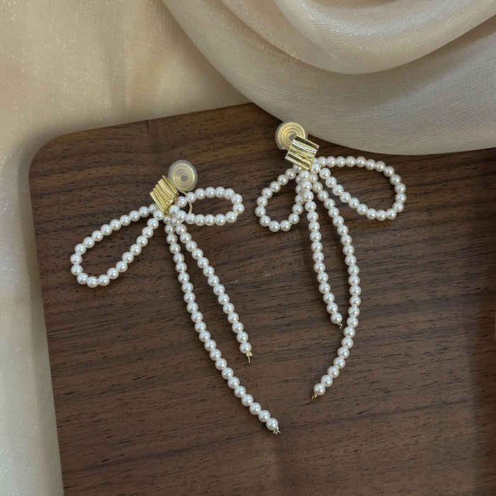 Wholesale Pearl temperament long tassel earrings, niche design, high-end long tassel ear clip