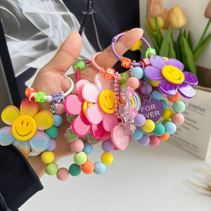 Wholesale Cute letter sunflower bag pendant with smiling face, colorful handmade bead key chain