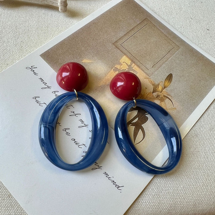 Wholesale Red and blue contrasting geometric ring earrings exude a literary and artistic atmosphere, with personalized and niche earrings for women