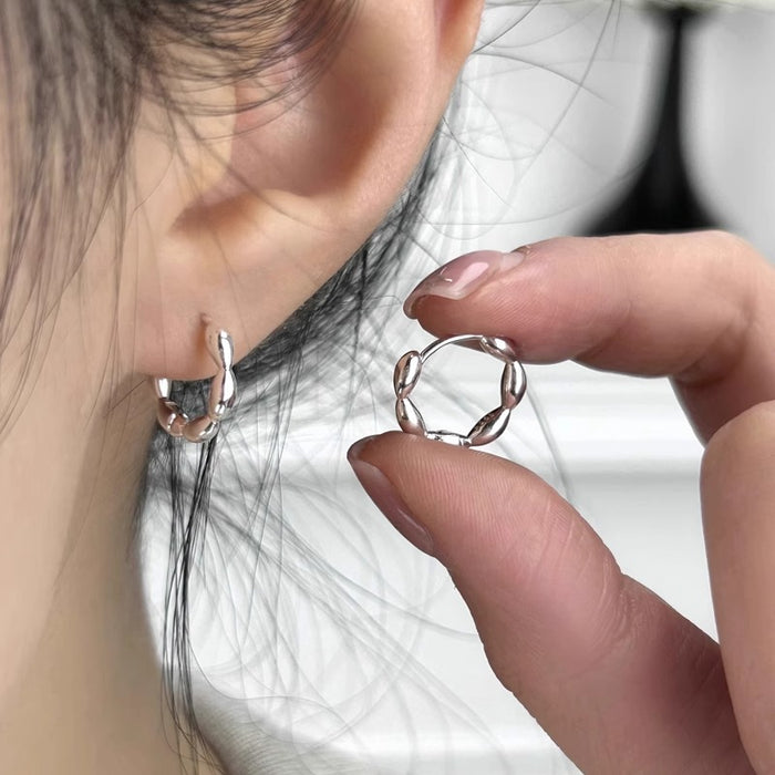Wholesale Simple and versatile high-end sensory ring ear buckle earrings with elegant design, light luxury titanium steel earrings with ear rings