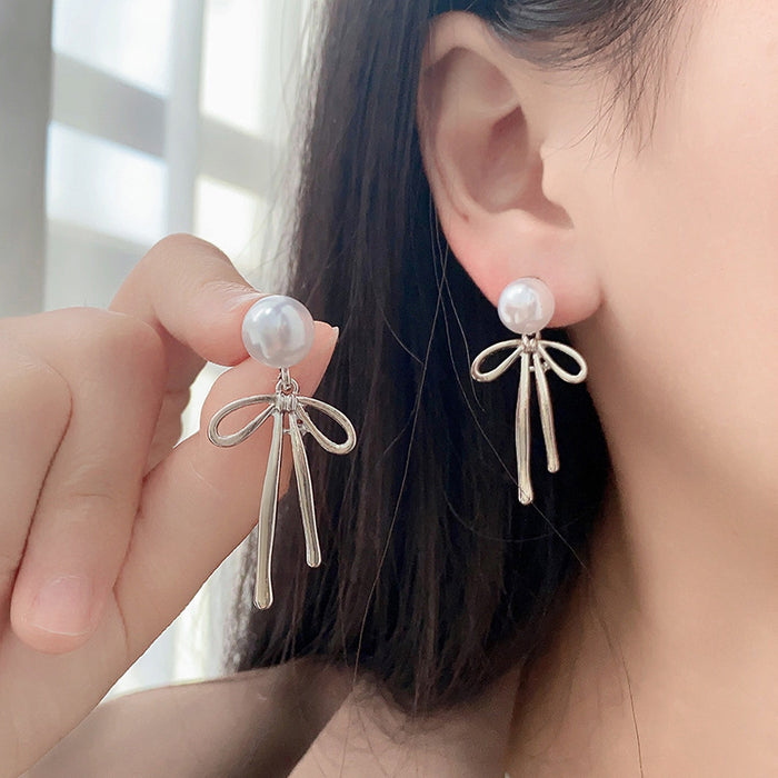 Wholesale Pearl earrings, light luxury, simple bow design, niche design, high-end accessories wholesale