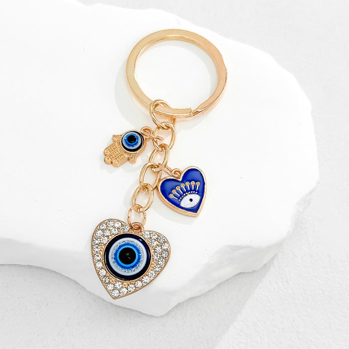 Wholesale Heart-Shaped Palm Water Drop Devil's Eye Pendant Keychain