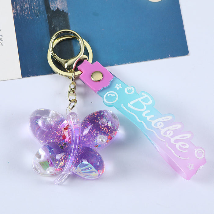 Wholesale Acrylic oil butterfly quicksand keychain bag pendant candy color