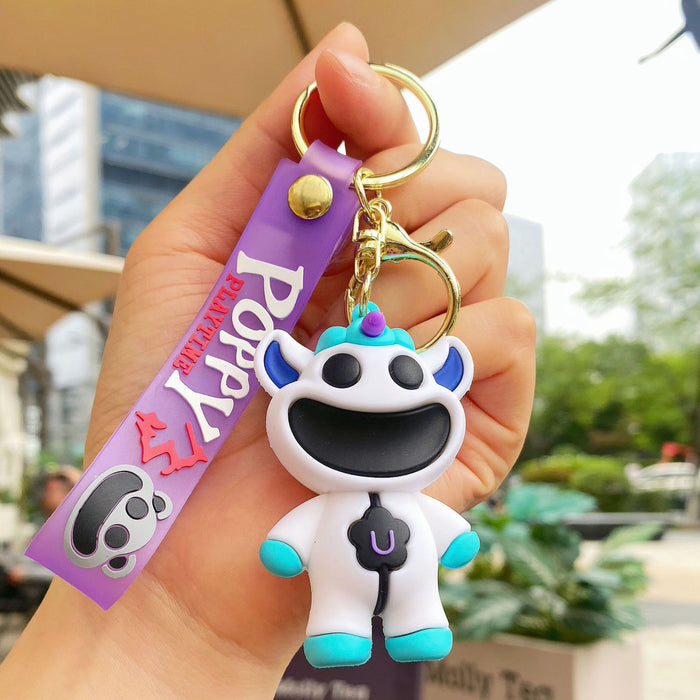 Wholesale Cute silicone smiling animal keychain