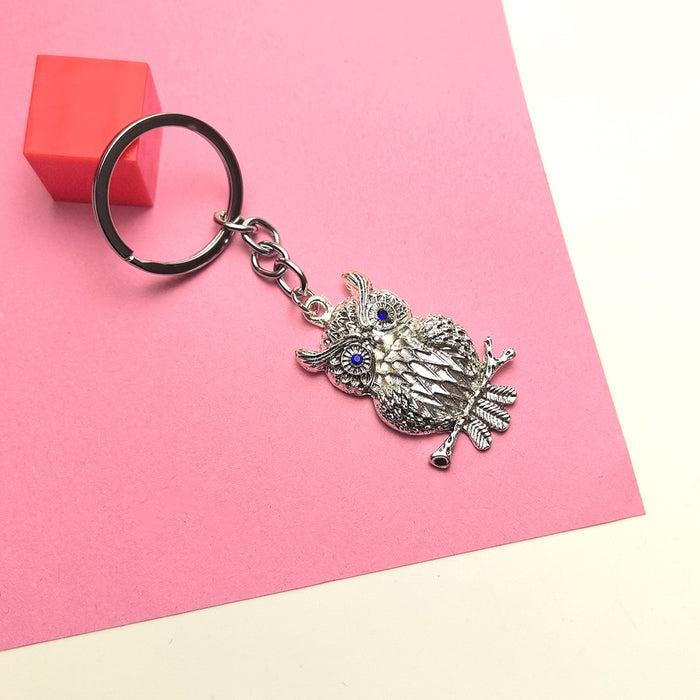 Wholesale Blue Eye Pendant Flower Butterfly Keychain Pendant Bag