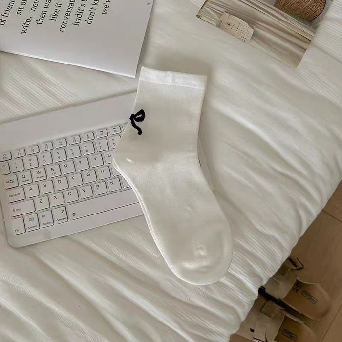 Wholesale Grey bow middle tube socks, pure cotton heel long tube pile socks